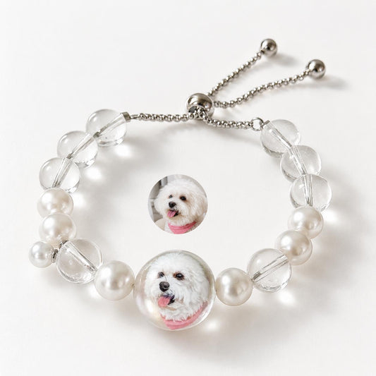 Custom pet portrait pearl bracelet with hand-painted dog face on button pearl centerpiece, crystal beads and adjustable chain